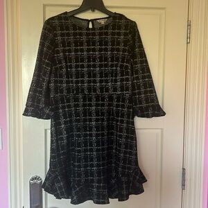 Stunning black and silver dress with ruffle detail